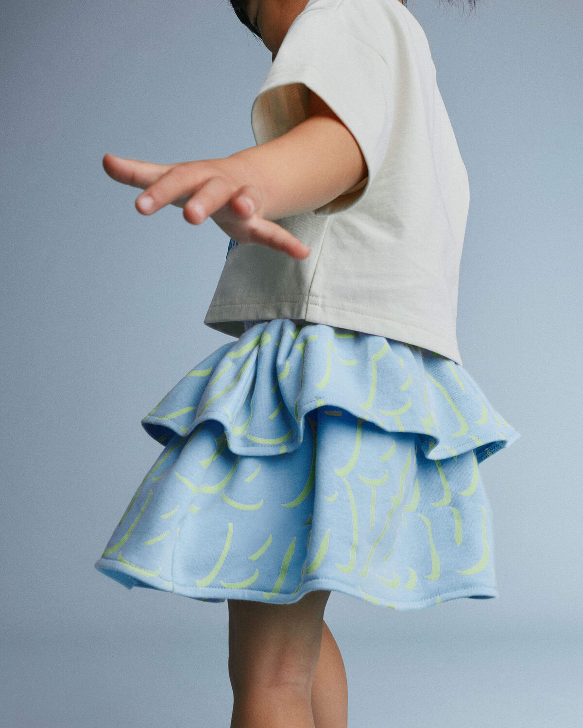 Toddler Girl Smocked Tiered Skirt in Otter Avenue Print - Light Blue/Lime Green - Image 3