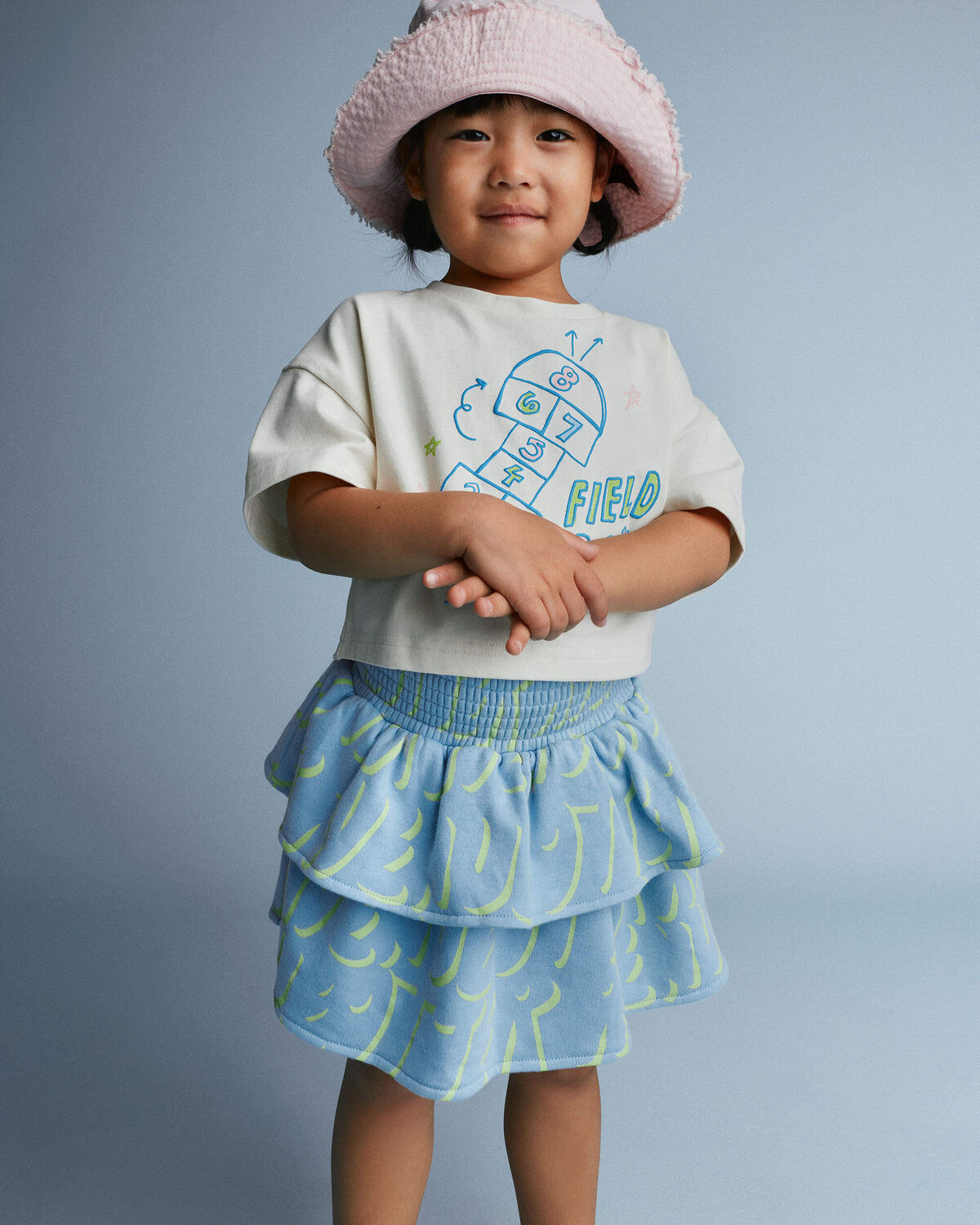 Toddler Girl Smocked Tiered Skirt in Otter Avenue Print - Light Blue/Lime Green - Image 4