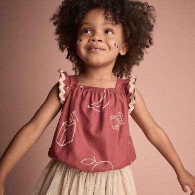 Toddler Girl Ruffle Peplum Top in Snack Print - Red